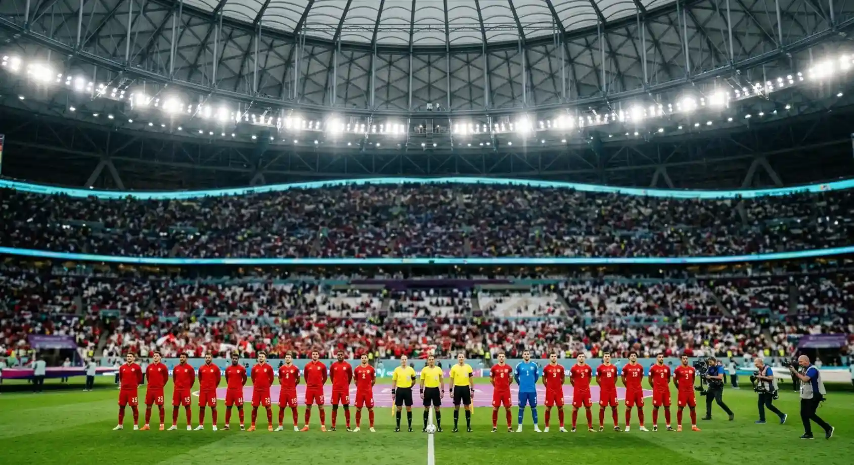 Spain and Belgium players line up before a World Cup 2026 quarter-final at a floodlit stadium